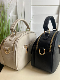CRYST BAG FRNT ZIP RND MEDLLN