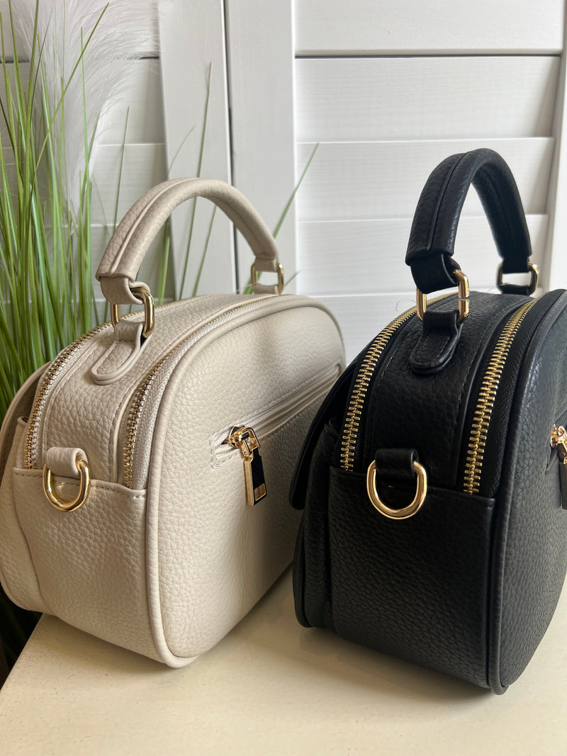 CRYST BAG FRNT ZIP RND MEDLLN