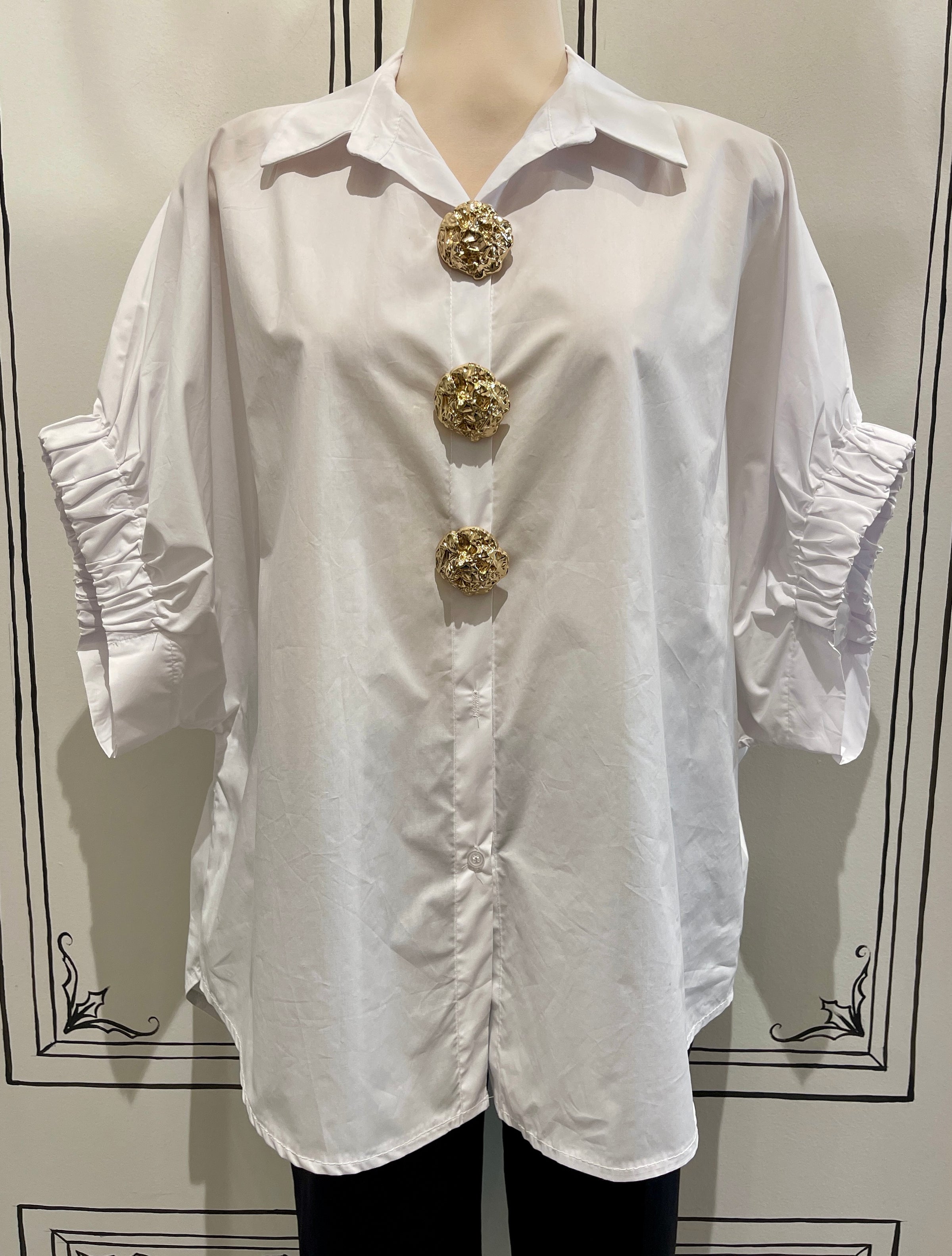 BLOUSE WITH STATEMENT BUTTONS