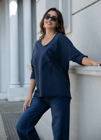 ORANGE PULLOVER LG BOW