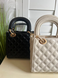 CRYST BAG TOP HNDLE QUILTD DIO INSP