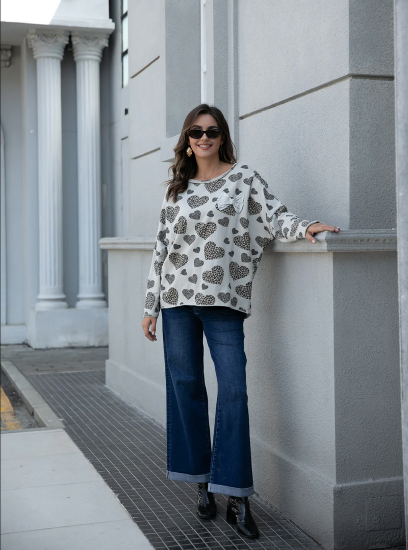 ORANGE ANIMAL HEART PULLOVER BOW
