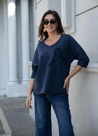 ORANGE PULLOVER LG BOW
